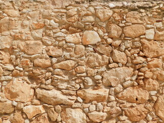 stone wall in the old town of Ayia Napa. Cyprus. Texture Photo