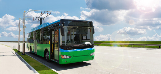 Electric bus at a stop is charged by pantograph	

