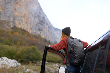 woman hiker near car journey trip nature mountains