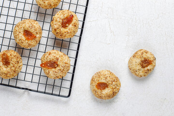 Delicious homemade walnut and jam cookies.
