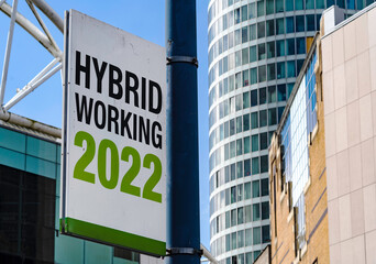 Hybrid Working 2022 sign in a downtown city center