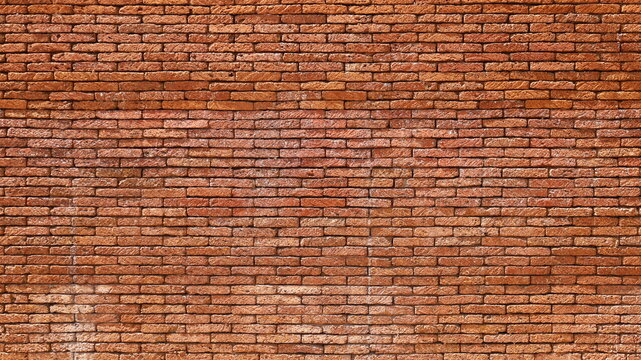 A reddish brown laterite brick wall. Attractive antique red brick wall texture for background designs with copy space. Selective focus
