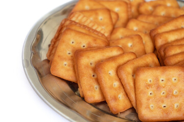 Fototapeta na wymiar indian biscuits wheat biscuits in the plate white background