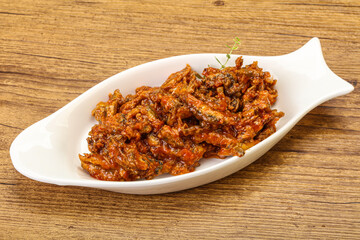 Canned anchovy in tomato sauce