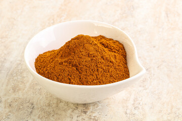 Dry Paprika powder in the bowl