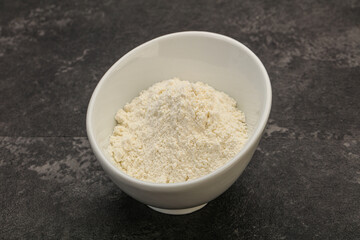 Wheat flour heap in the bowl
