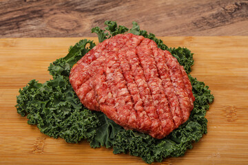 Raw beef burger cutlet for cooking