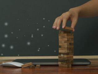 Abstract stacked wooden boxes that inspire corporate development, economic growth, organizational fulfillment, and a Better tendency to achieve goals