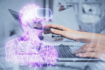 Double exposure of woman hands typing on computer and man in AR glasses drawing. Education concept.