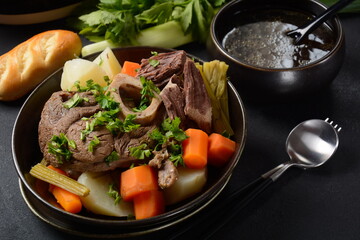 Pot-au-feu, traditional french stew. Stewed beef and potatoes. In France considered a national dish.