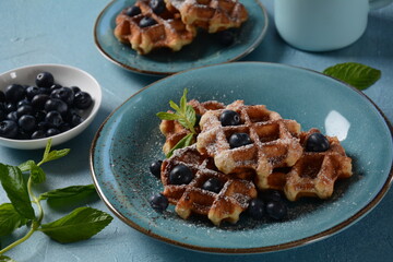 Traditional belgian waffles with fresh fruit  or american waffles delicious sweet dish, dessert snack menu concept