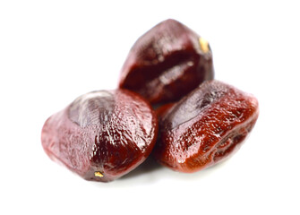 Tamarind (Tamarindus Indica) Stones (Seeds). Also known as Indian Dates. Isolated on White