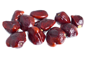 Tamarind (Tamarindus Indica) Stones (Seeds). Also known as Indian Dates. Isolated on White