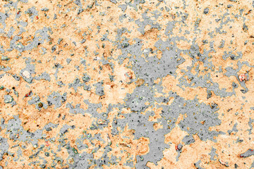 Texture of a concrete wall with cracks and scratches which can be used as a background