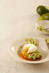 Smashed avocado on a sliced bread