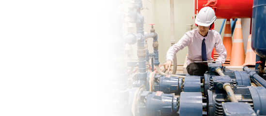 Engineer checking Condenser Water pump and pressure gauge , chiller water pump with pressure gauge....