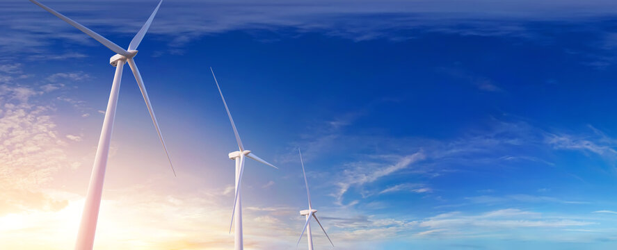 Wind turbines generate electricity. 3D illustration. Wind turbines: 3d-model. Background: photo-panorama. Sunset.