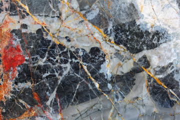 Gold, red and white patterned structure of dark gray marble (Gold Russia) texture for design. abstract nature background.