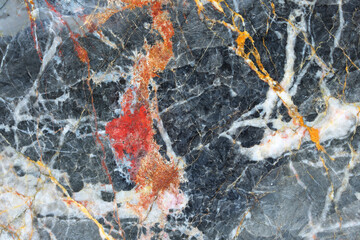 Gold, red and white patterned structure of dark gray marble (Gold Russia) texture for design. abstract nature background.
