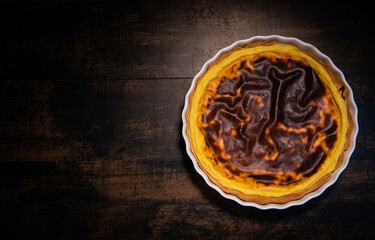 Parisian Flan, cutted classic tart served on a plate copy space. High quality photo