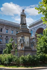 Fotobehang Oude meesters Leonardo Da Vinci Statue on Blue Sky Closeup in Milan, Italy  © Sergey