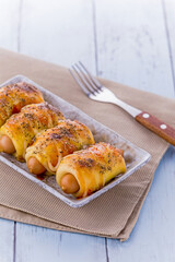 Mini pizza with sausage and cheese