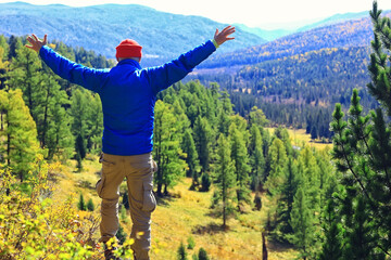 mountain man raised his hands, concept freedom victory active adventure