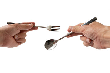 hand holding silver fork and spoon on white