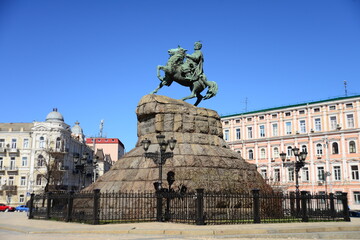 KYIV, UKRAINE - APRIL 5, 2019: Monument of Bohdan Khmelnytsky, the Hetman of Ukrainian Zaporozhian Cossacks, on Sofia square in Kyiv, Ukraine. St. Michael's Golden-Domed Monastery on the background