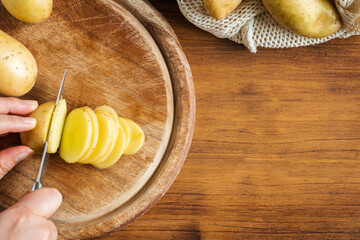 Delicious snack food skin potato chip french fries salad from fresh slice cut chopping by hand raw organic bio sweet potatoes homemade authentic cook healthy oil free bake with salt mayonnaise vegan