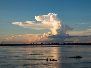 Naklejka na ściany i meble Sunset over the Amazon river