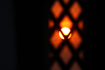 big bright sun behind the window