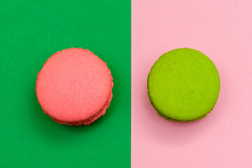 two color macaron cakes on a two paper color background