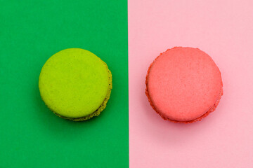 two color macaron cakes on a two paper color background