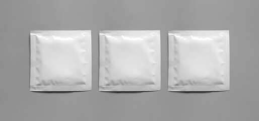 Blank packaging paper wet wipes pouch.Packaging for wet wipes isolated on gray background.Can be use for your design.High resolution photo.