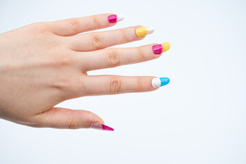 girls hand with Two-tone manicure on white background