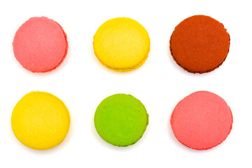 six multicolored macaron cakes on a white background