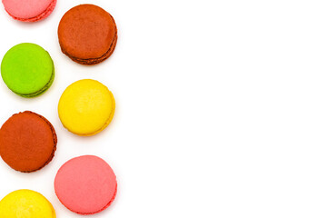 color macaron cakes on a white background