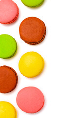 multicolored macaron cakes on a white background