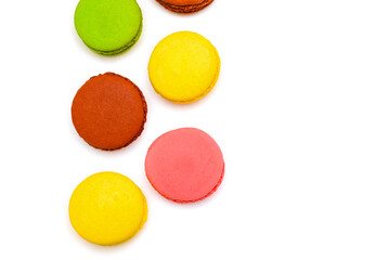 color macaron cakes on a white background