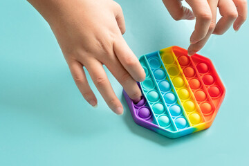 Silicone toy antistress pop it. New trend from tik tok. Colorful anti stress silicone sensors toy. - obrazy, fototapety, plakaty