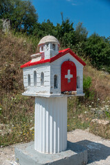 Fototapeta na wymiar Kandylakia - typical greek miniature roadside shrine