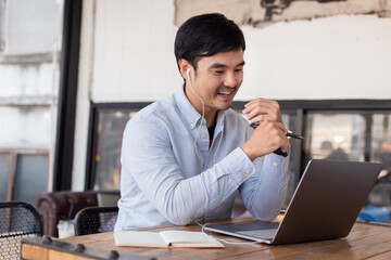 asian man work using computer hand typing laptop keyboard contact us.student study learning education online.adult professional people chatting search at office.concept for technology device business