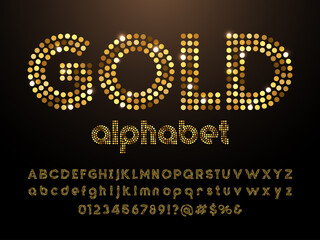 Gold dotted glittering style alphabet design with uppercase, lowercase, numbers and symbols © FotoGraphic