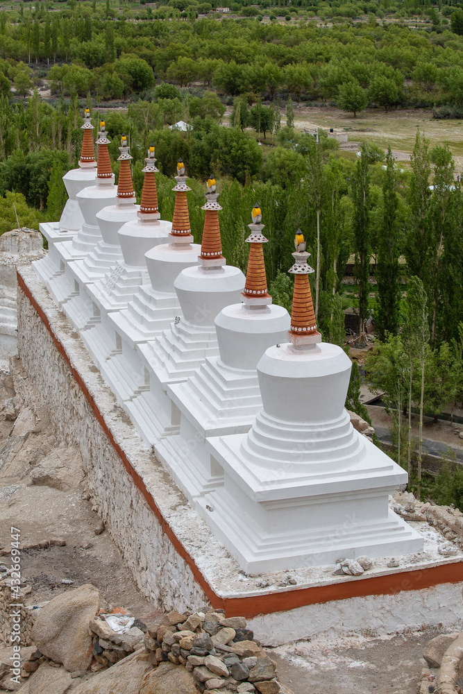 Wall mural white buddhist stupa or pagoda in tibetan monastery near village leh in ladakh, noth india