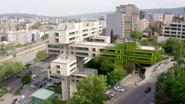 Tbilisi, Georgia. Building of Bank of Georgia headquarters ex for the Ministry of Highway. Beautiful Soviet constructivists, Brutalist and Structuralism. Aerial drone photo from above