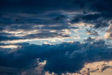Naklejka na ściany i meble dramatic clouds and sun over Salzburg City