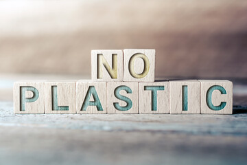 No Plastic Written On Wooden Blocks On A Board - Save Earth Concept