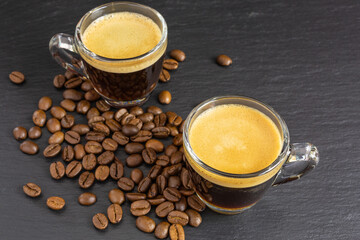 glass cups with espresso with coffee beans