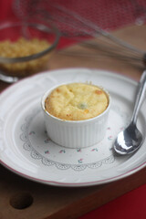 Cupcake with red background and cuttensil